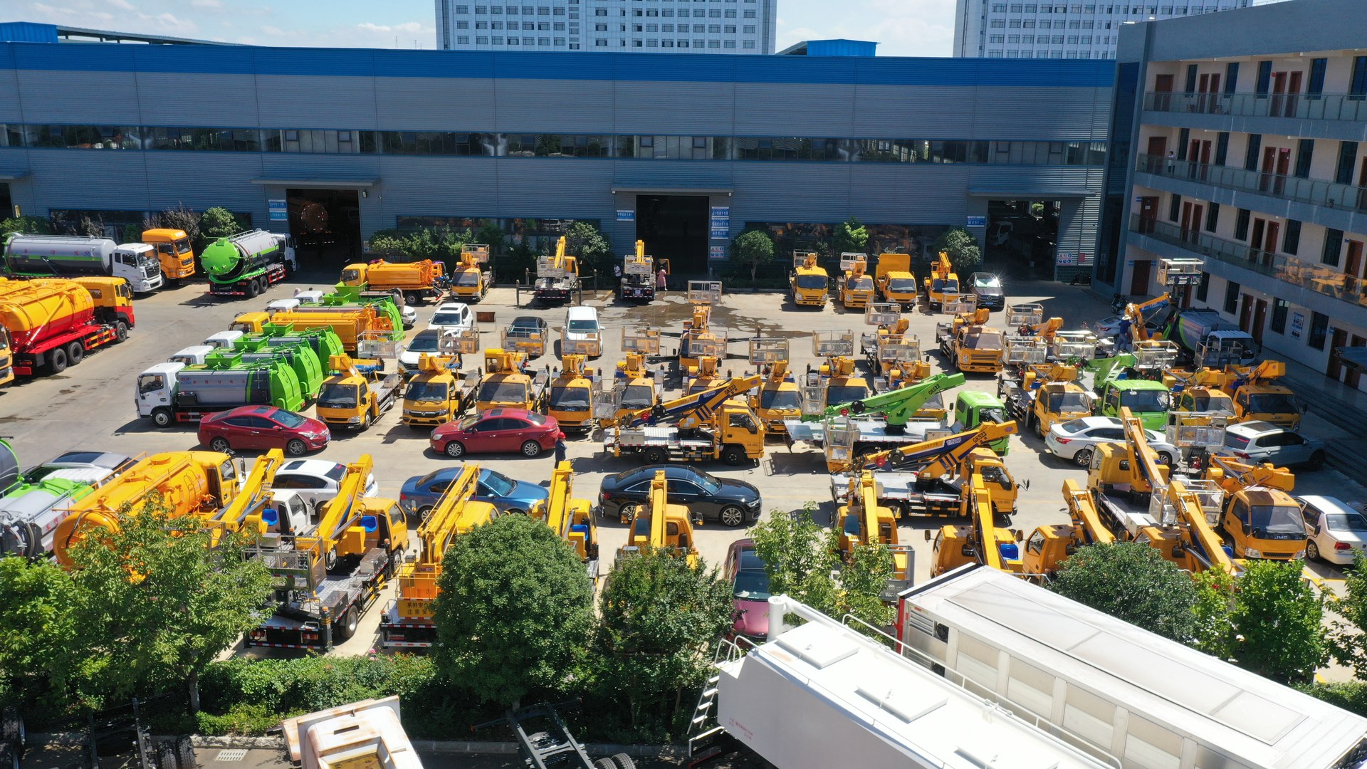 Rows of special-purpose vehicles near the Chengli production workshops