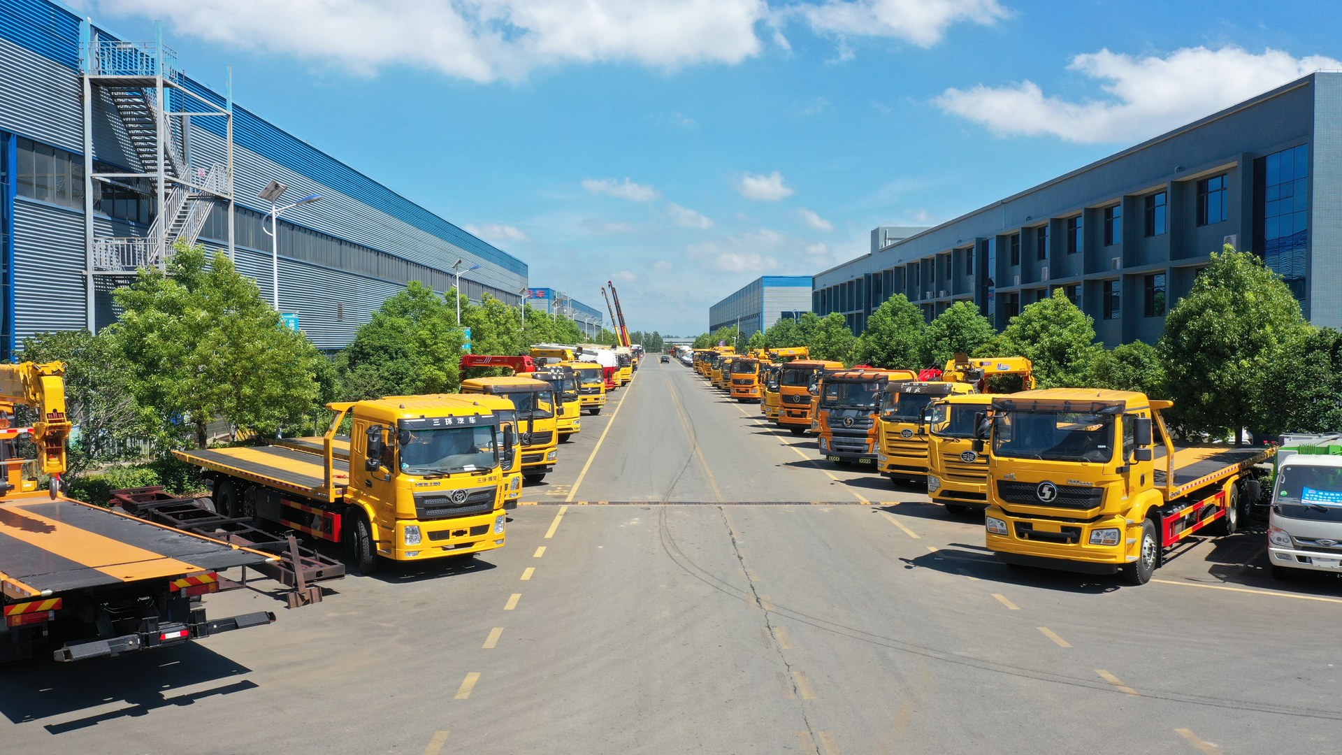 Special-purpose trucks outside Chengli production buildings
